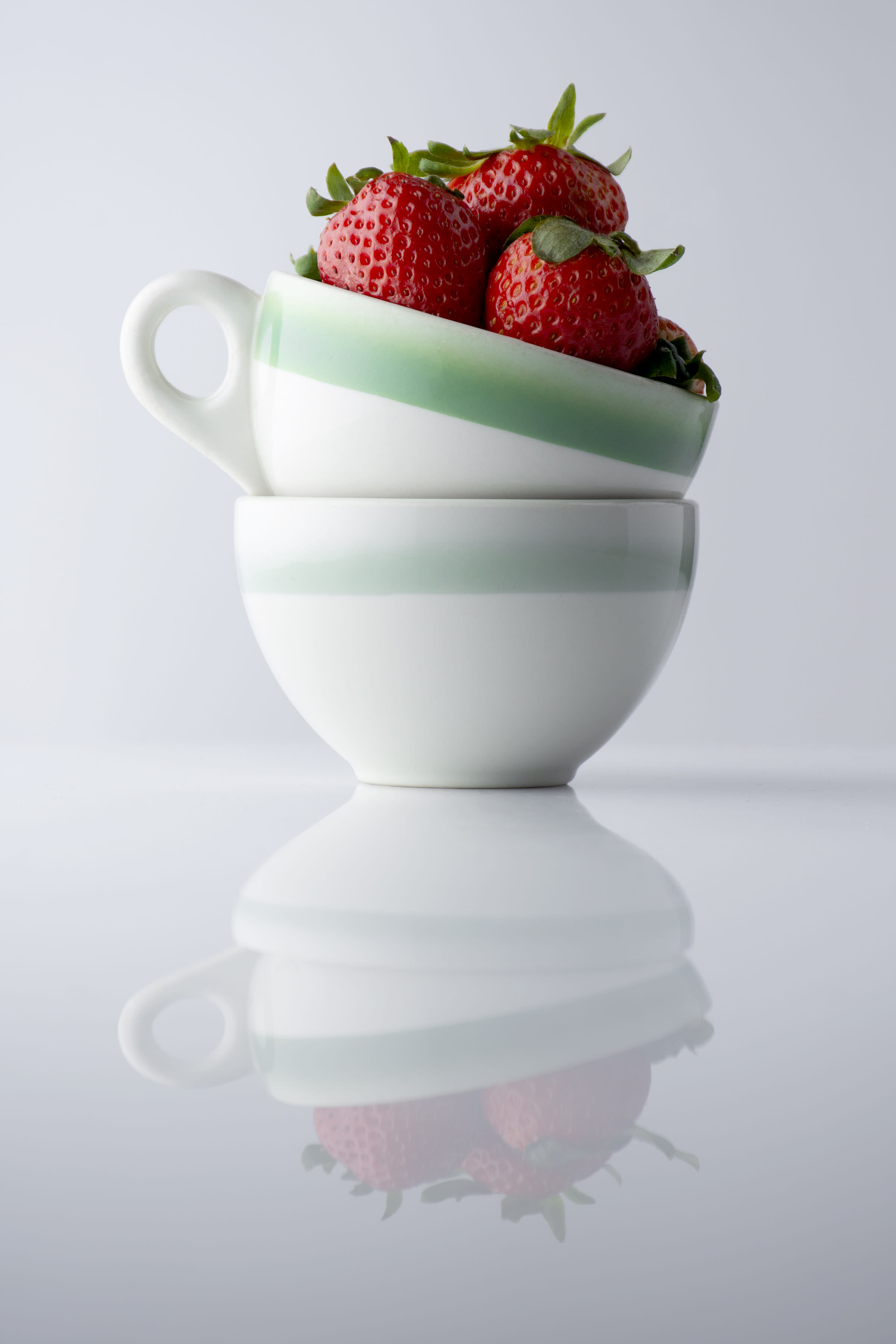 berries in a tea cup - award winning photo