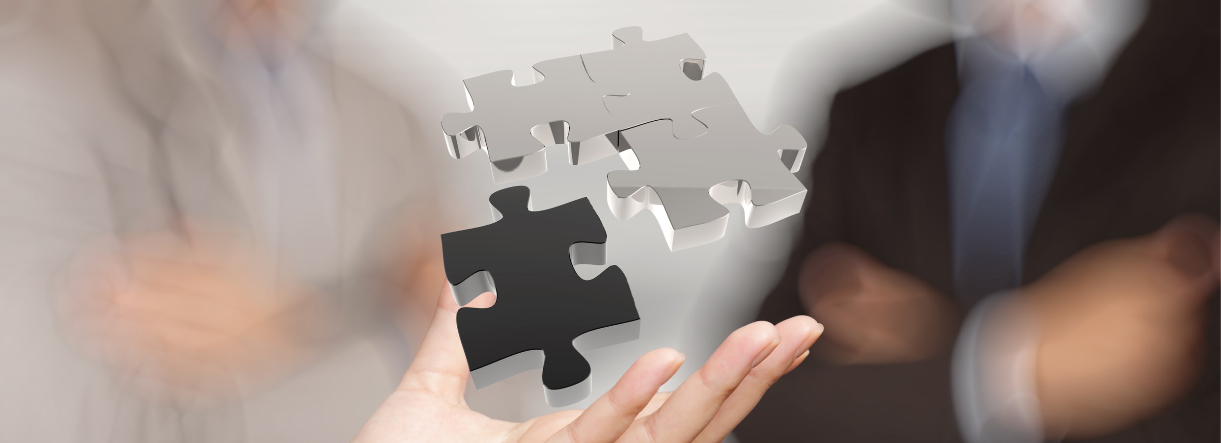 business puzzle pieces sorted by a marketing consultant